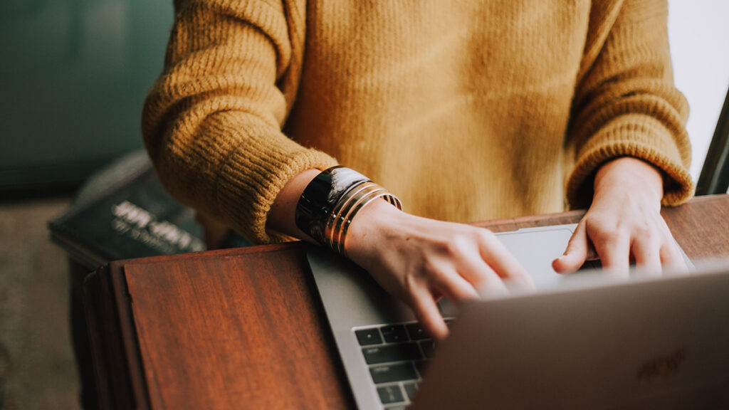 A person working with a laptop